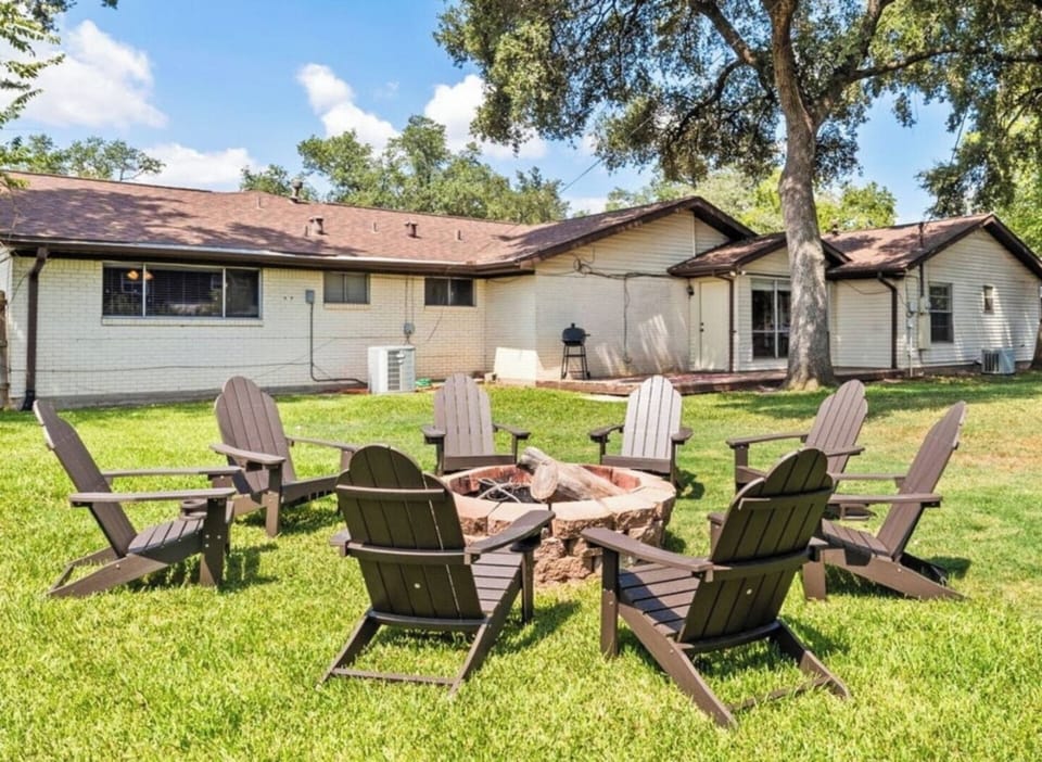 Welcome to Aggie Village! Gather under the trees and enjoy cozy nights around the fire pit.