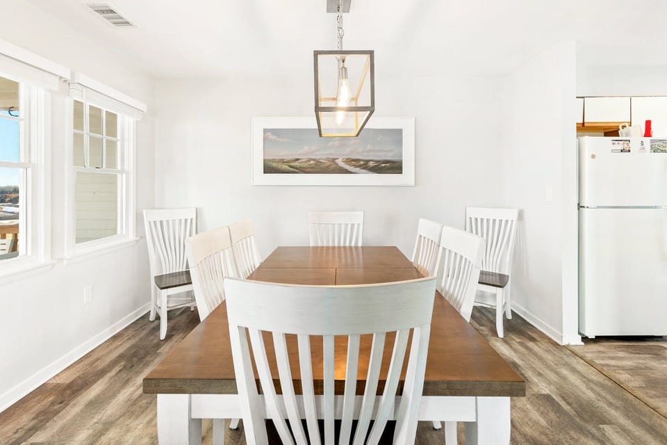 Dining Area: Dining space designed for shared meals, family gatherings, or casual entertaining, located just off the kitchen and living area.