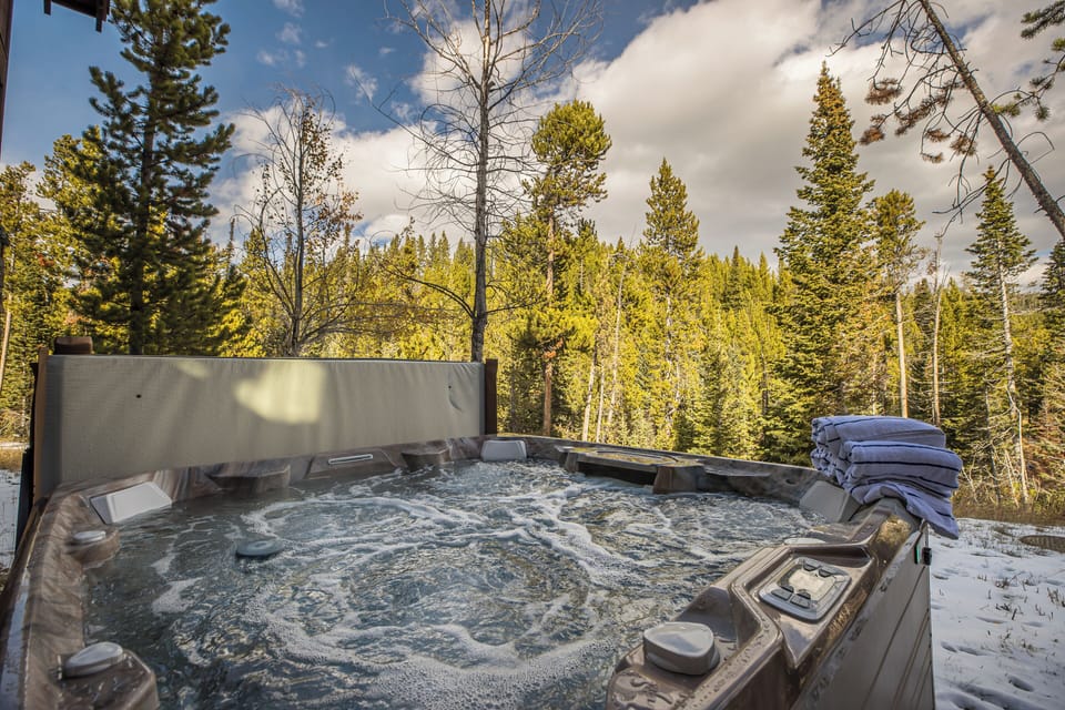 Relax after a day of exploring Lone Mountain in the home's hot tub.