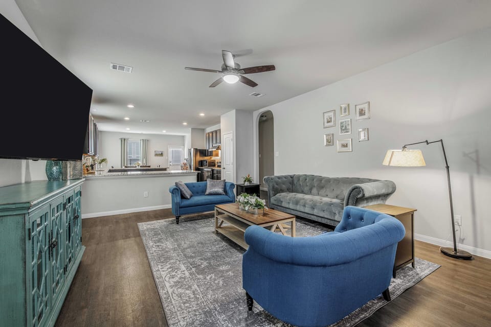 The perfect spot to gather—plush seating and a flat screen TV.