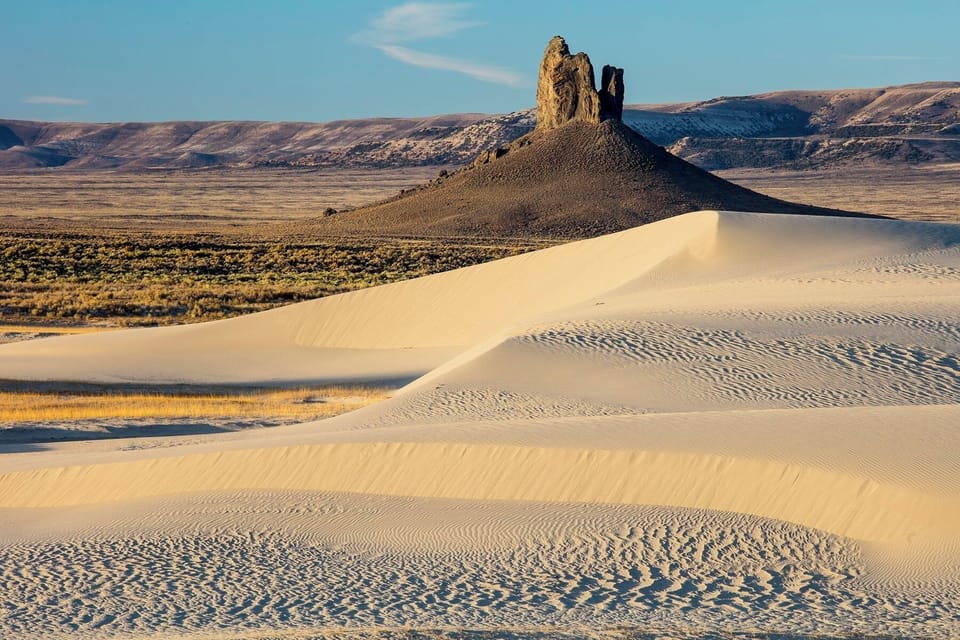 Escape into sweeping dunes and silence, just beyond your door.
