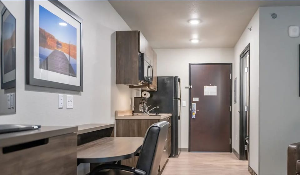 Arrive effortlessly to a bright kitchenette ready for simple meals.
