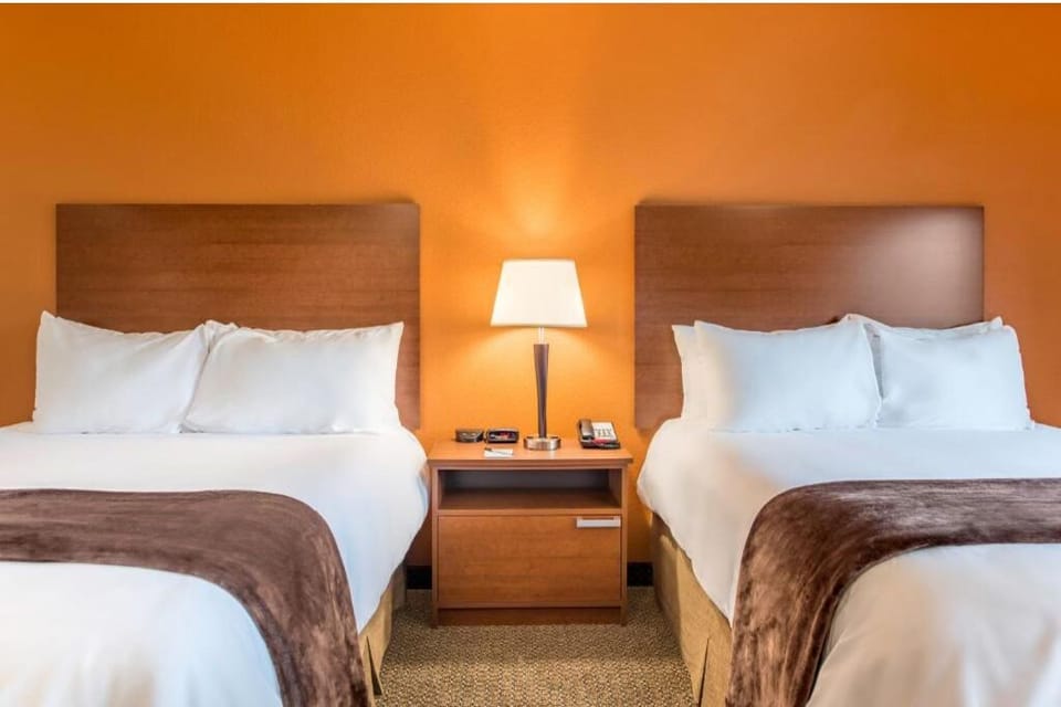 Sink into plush pillows after a long day of exploring.