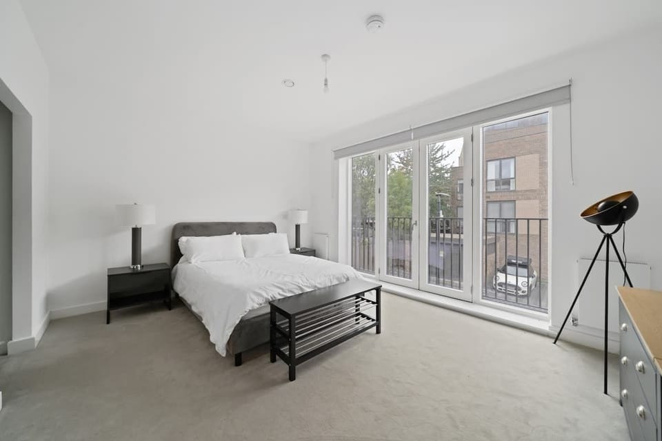  A large, modern, stylish Master King with dressing area and En-Suite Bathroom with spacious Shower. 
75" TV with surround sound... Movie night in bed? :-) 