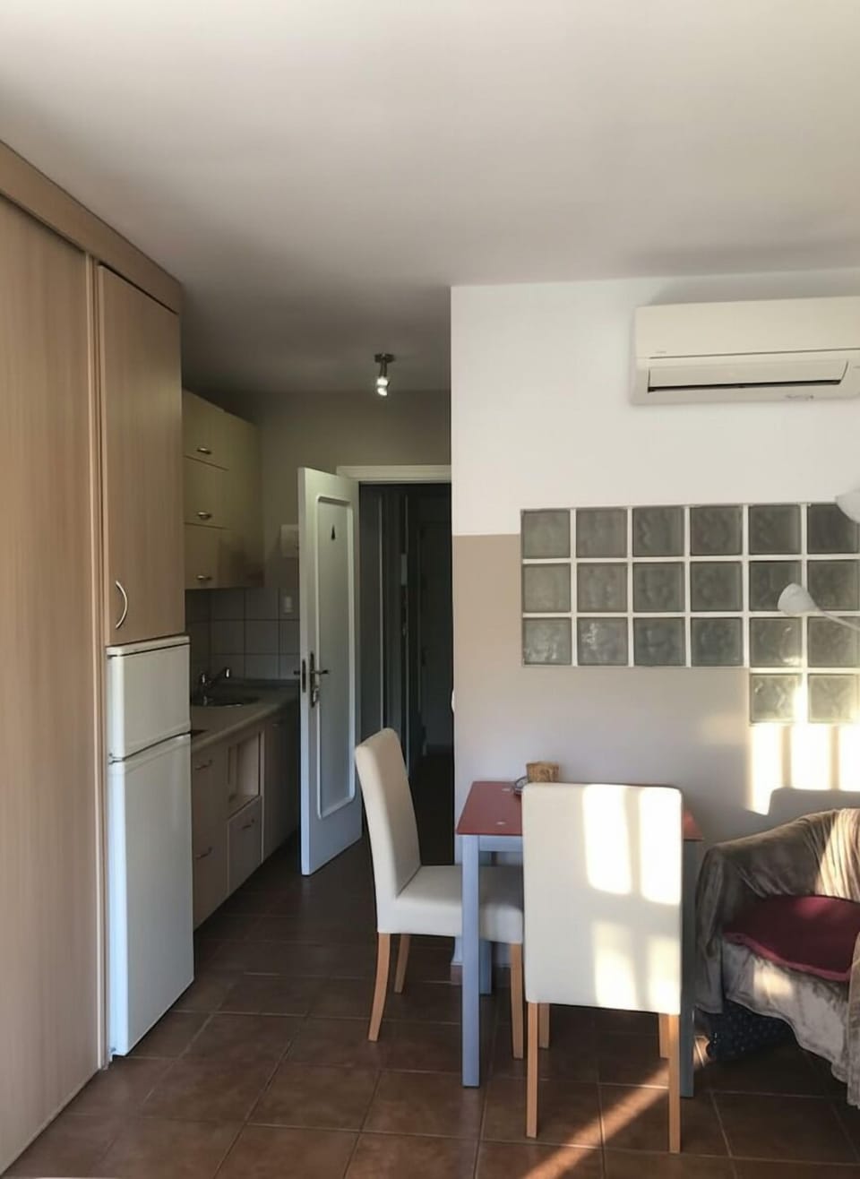 Compact Dining Area with Open Kitchen