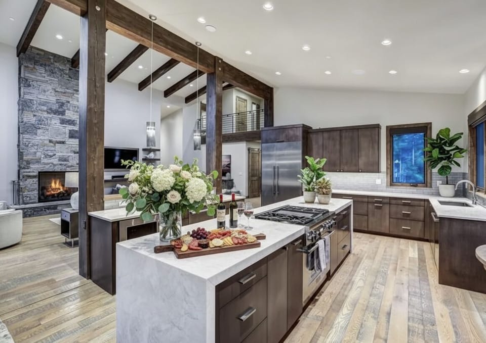 Dream Kitchen — a chef's paradise with top-tier appliances, sleek cabinetry, and an open design connecting kitchen, dining, and living spaces. 🍳✨