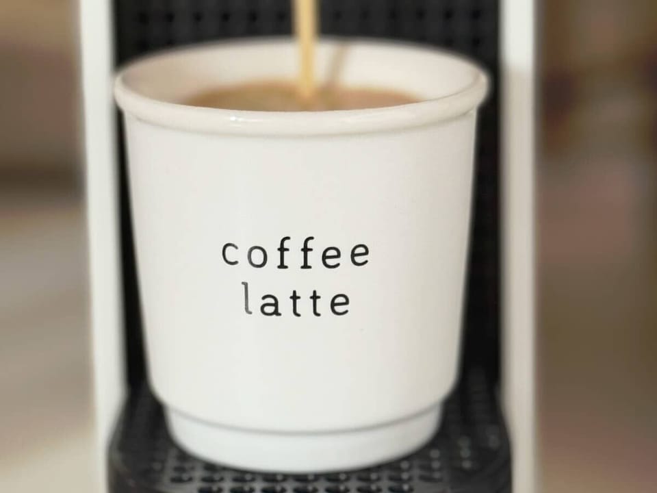 Start your day with a freshly brewed coffee from the Nespresso machine.