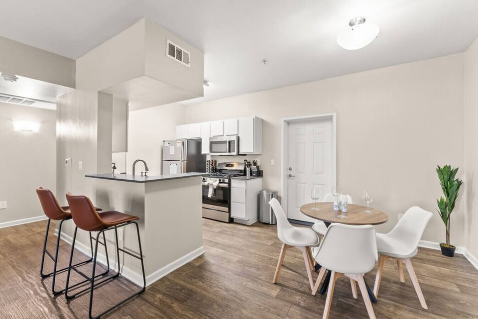 Fully equipped kitchen and dining space with everything needed for home-cooked meals.