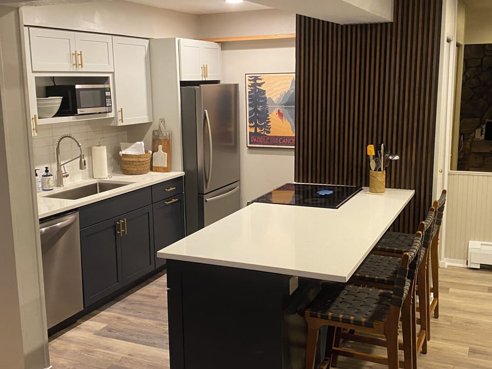 All new cabinets, countertops, backsplash, floor, appliances - September 2025