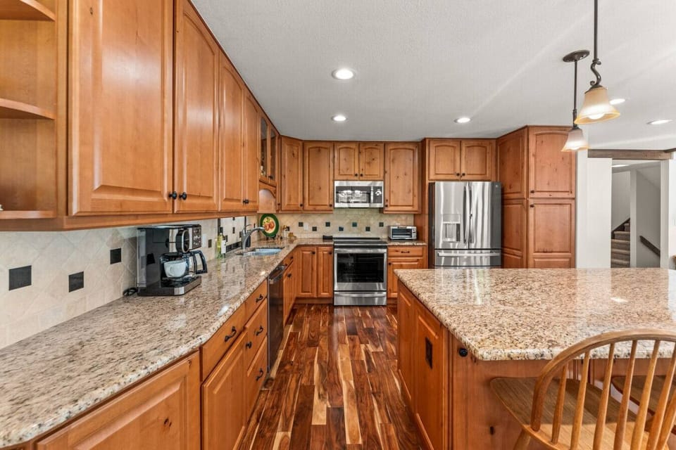 Fully equipped kitchen with large island and bar seating