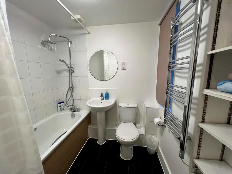 Master bathroom with bath & rain shower 