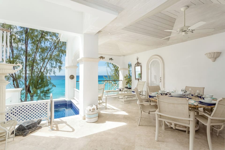 Beautiful verandah area with seating, plunge pool and stunning views of the Caribbean sea.