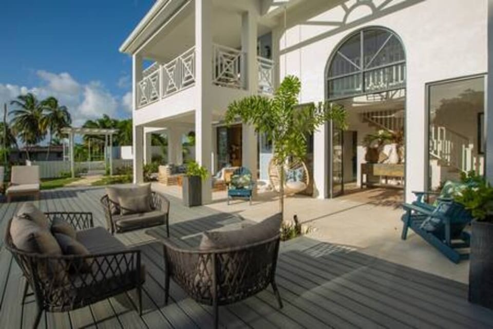 Plentiful seating options around the beautifully decked outside space.