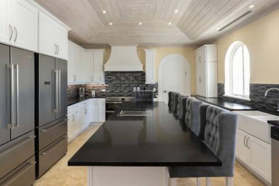Kitchen with 2 fridge freezers, hob, blender, dishwasher, coffee maker. A cook or chef can be provided at an extra charge of US$150-$200 per day, chefs are available 8 hours per day over the festive period.