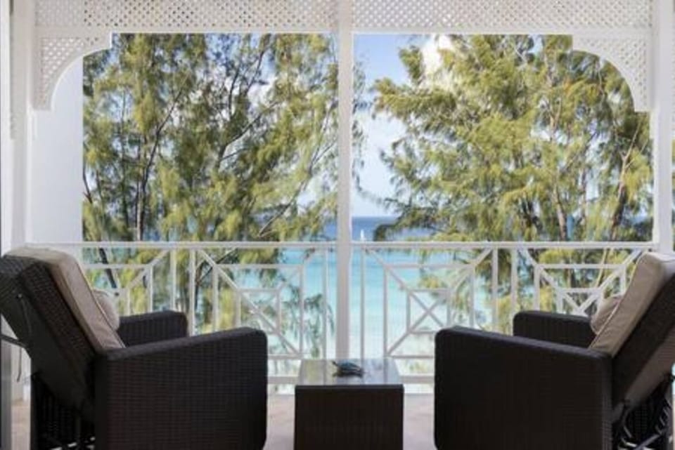 Private balcony with stunning views of the Caribbean sea.