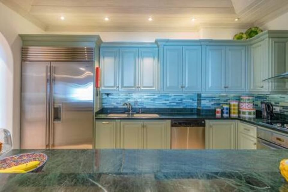 Well appointed kitchen including coffee maker, kettle, microwave, oven, hob and toaster.