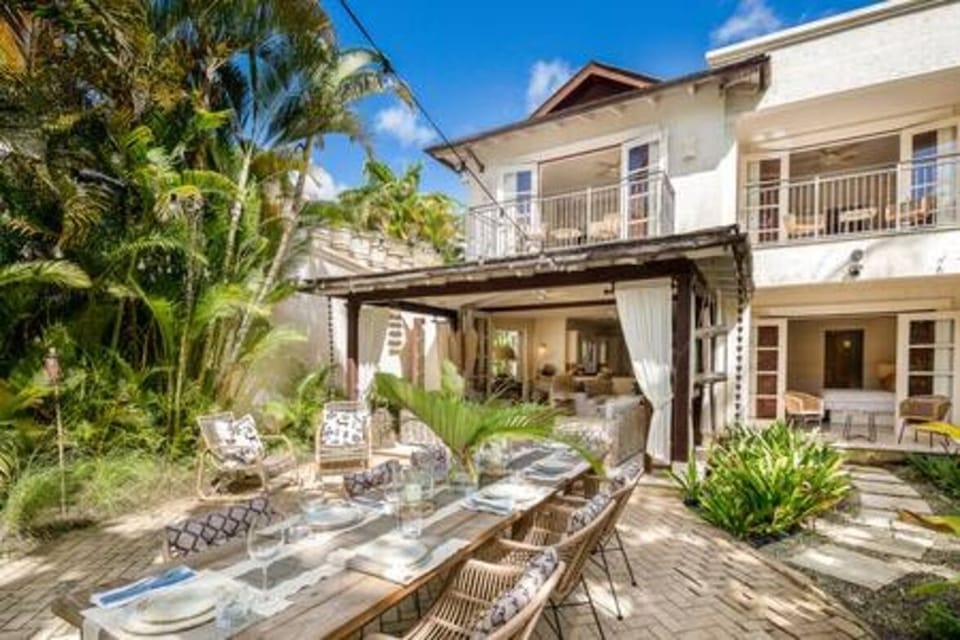 Stunning outdoor dining area, positioned perfectly amongst the beautifully maintained private garden.