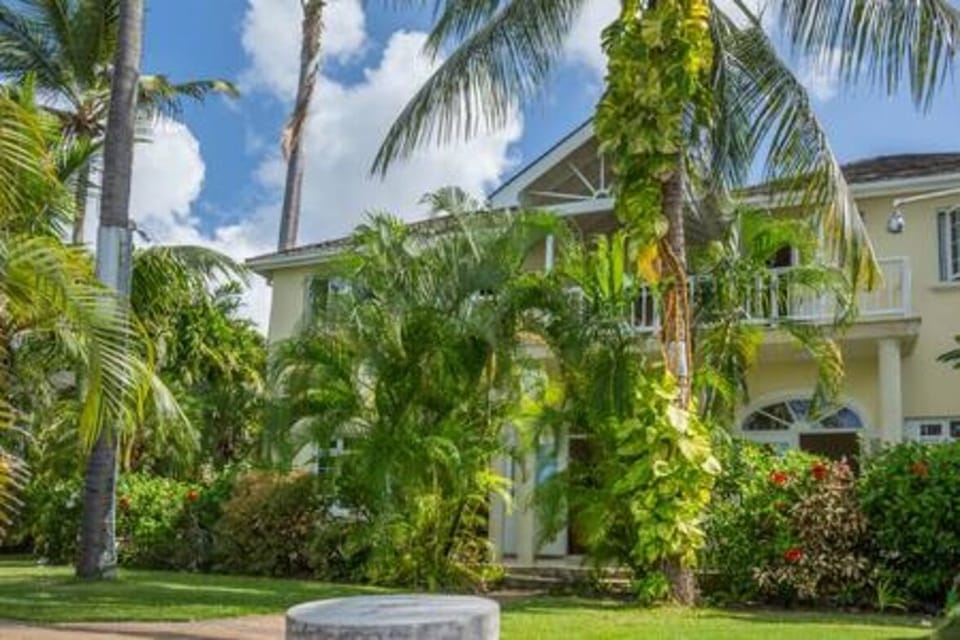 Beautiful Ebbtide nestled in its private gardens and memorising sea views.