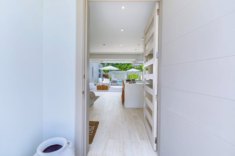 Welcome to Villa Palmier at Porters Place. A contemporary villa with air conditioning and all bedrooms are en suite.
