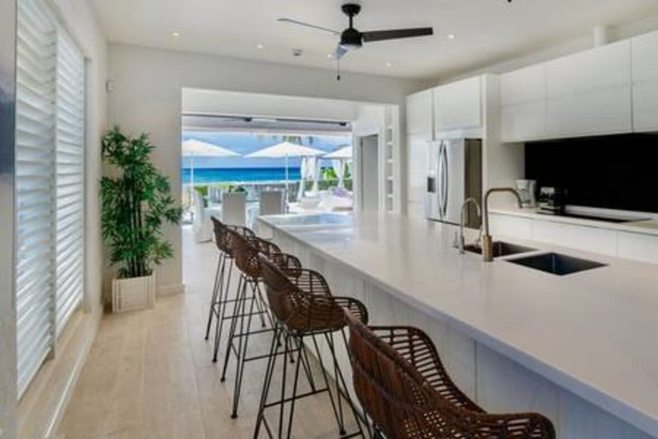 Well appointed kitchen including breakfast bar, coffee maker, wine fridge. 