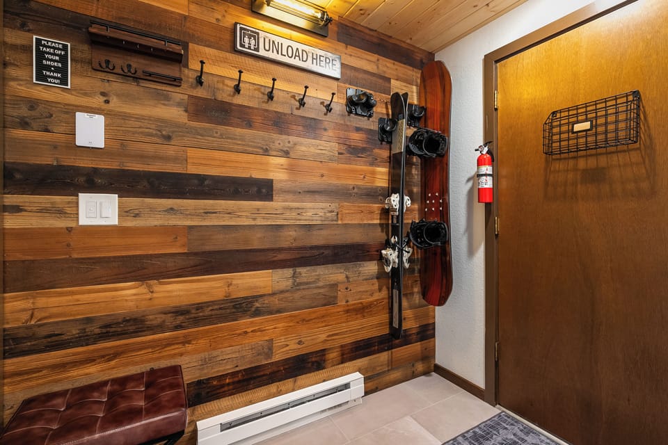 Entry with hangers for your skis/snowboards, gear, and heated tile floors