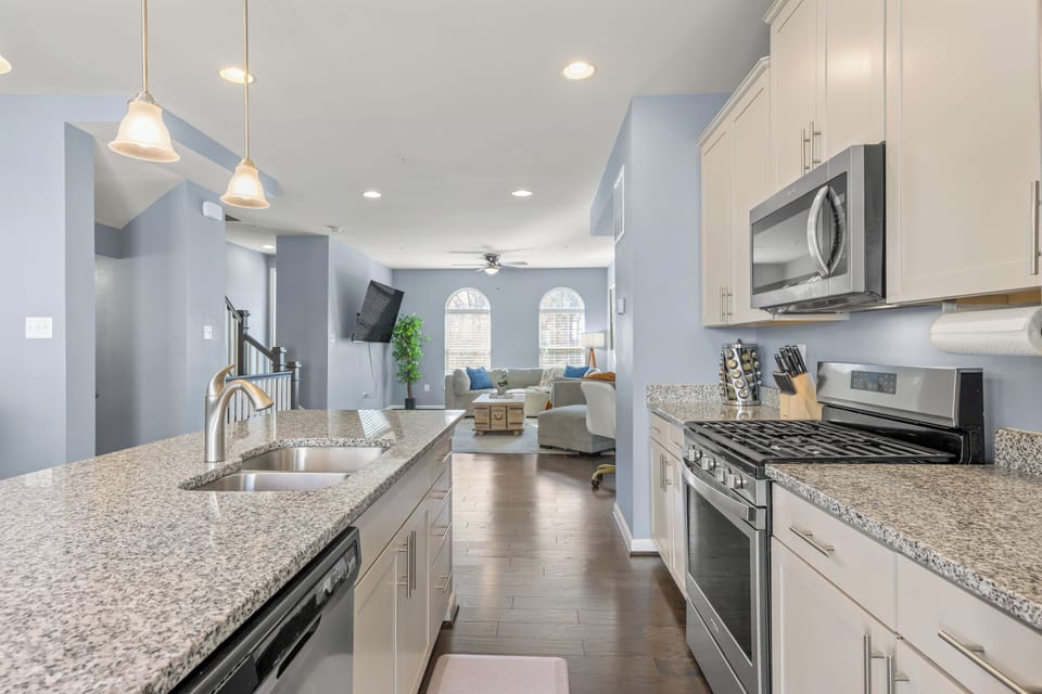 Open concept kitchen, dining and living room