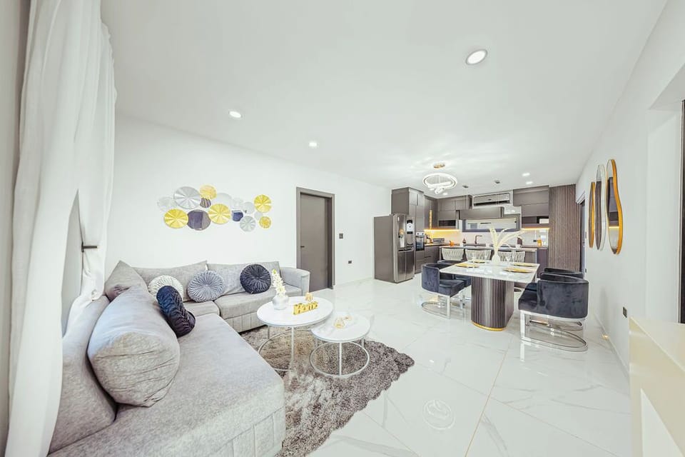 Bright and airy living room designed for comfort,a perfect for relaxing after beach days.