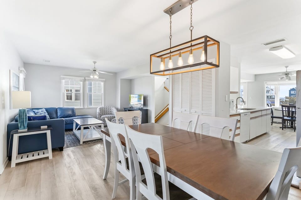 Dining Area — Dining table designed for shared meals, family game nights, or board games, with flexibility to double as a remote work space.