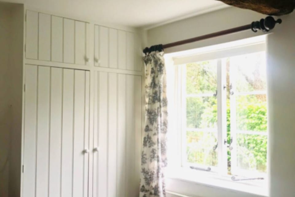 Lovely double bedroom on first floor with views out to the church spire 