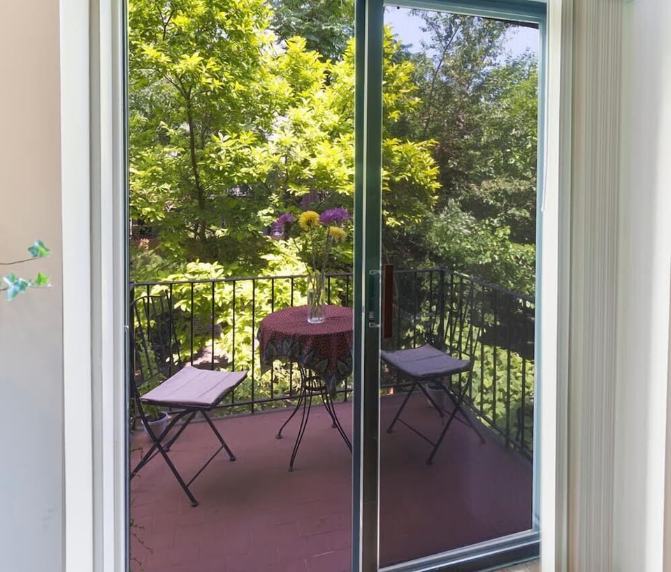 Lovely terrace overlooking the garden below. Gets great morning sun!
