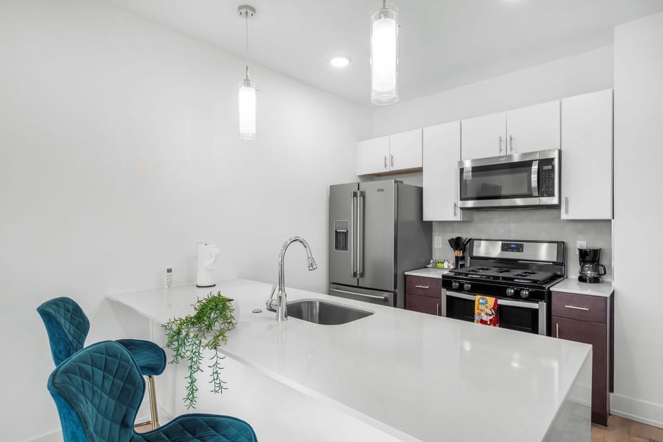 Fully equipped kitchen with modern appliances and ample counter space for all your cooking needs.
