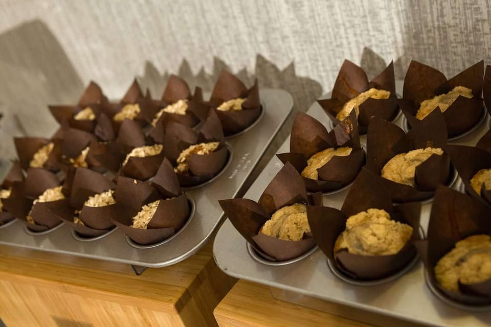 Freshly baked muffins displayed in paper wraps