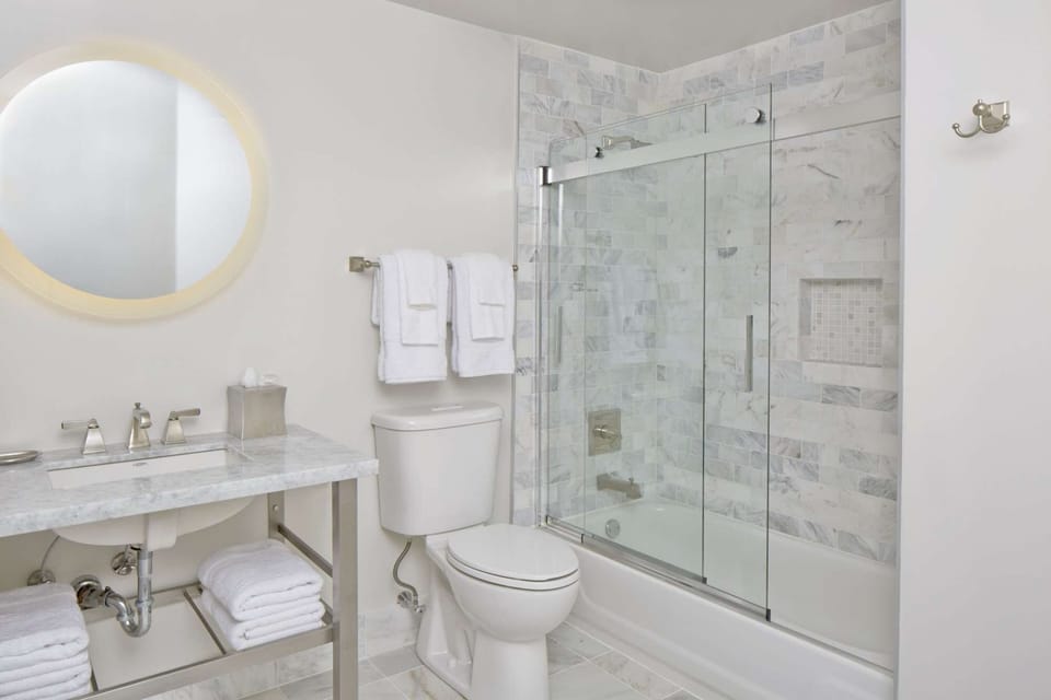 Bathroom with fresh towels and shower