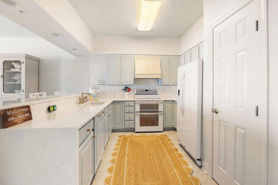 Harbour Pointe Unit 702 by PKRM - Beautiful, modern kitchen is fully equipped with everything you need.