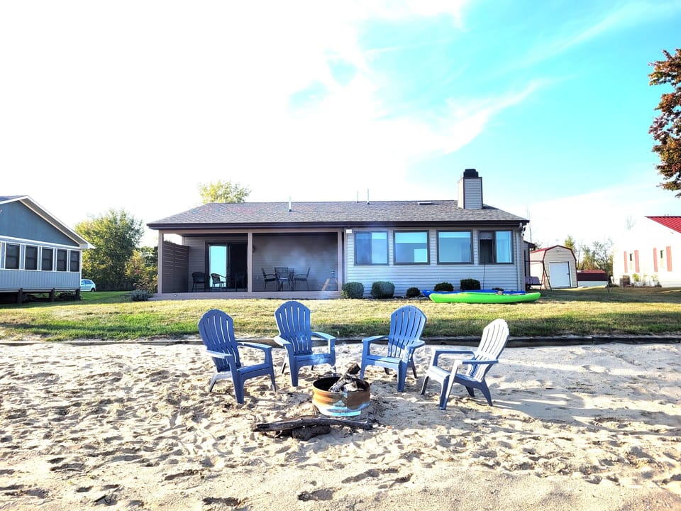 OVERVIEW:  Looking up at the house from the private beach on Lake Huron