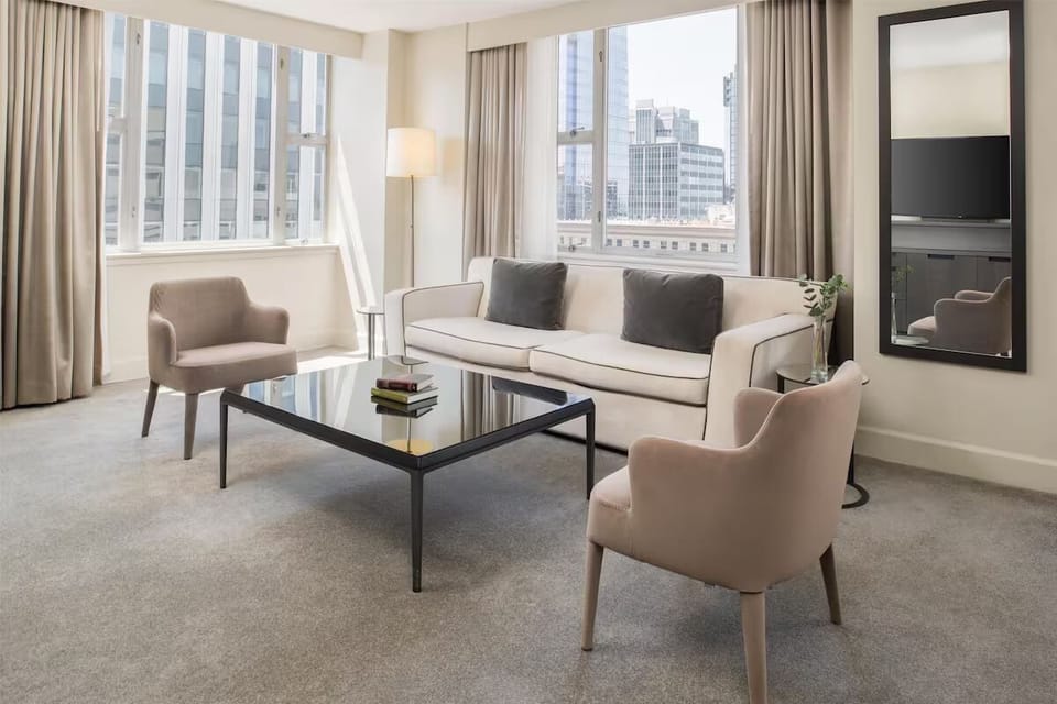 Linger by sunlit windows and enjoy sweeping city scenery.