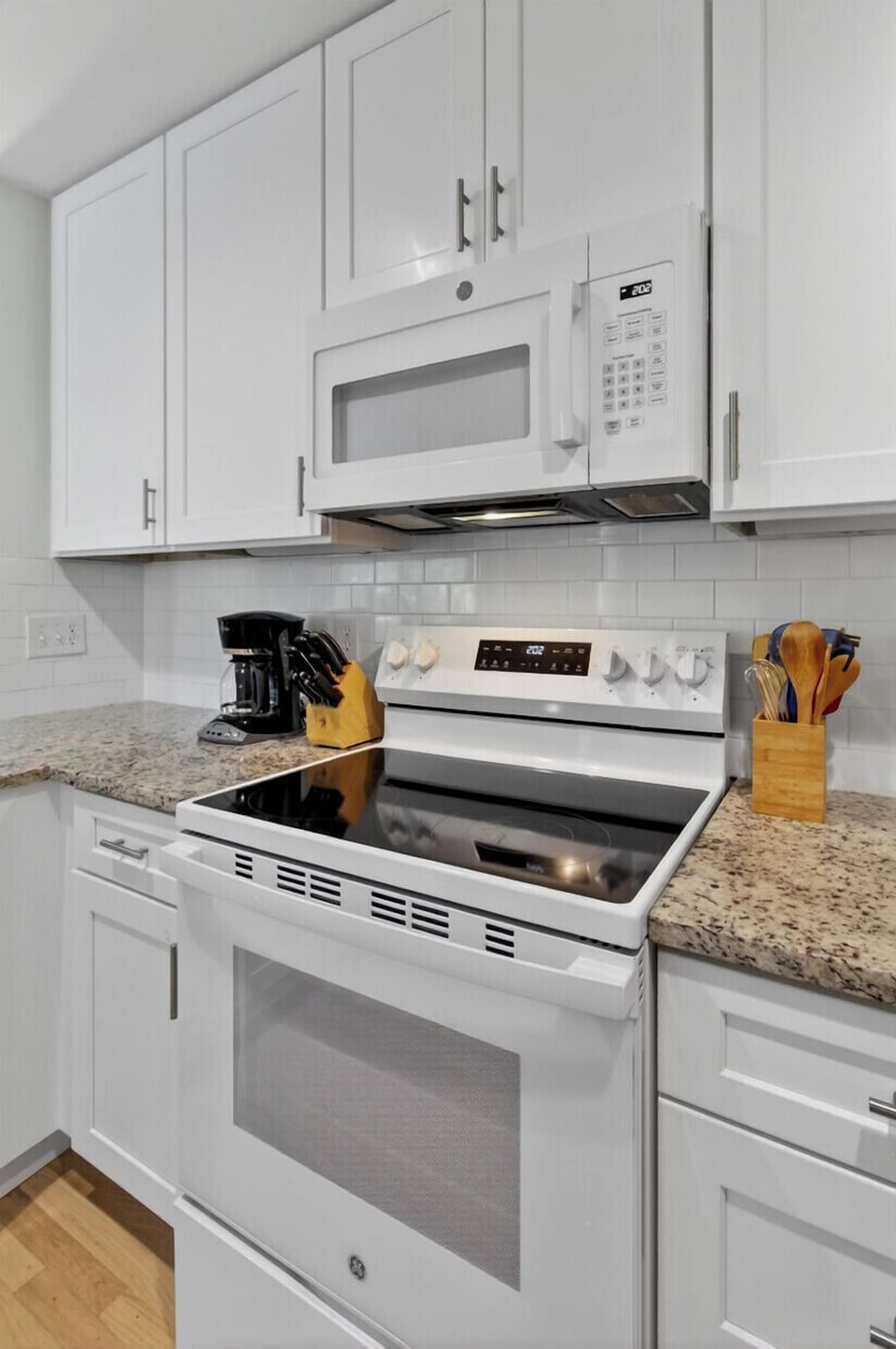 Whip up delicious meals in your fully-equipped kitchen with modern appliances and granite countertops.