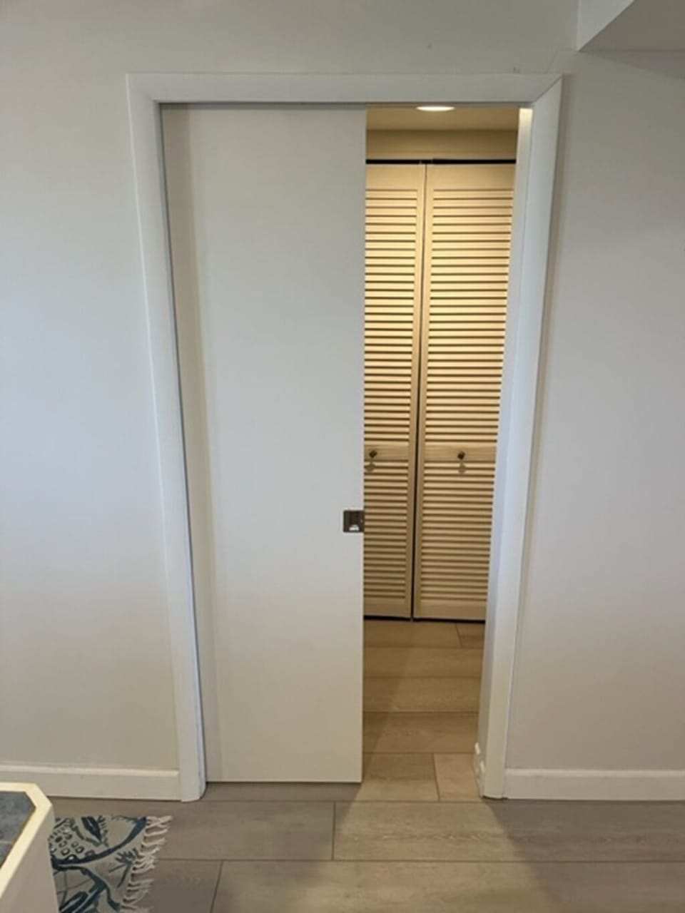 Pocket door turns guest room into private ensuite.  
