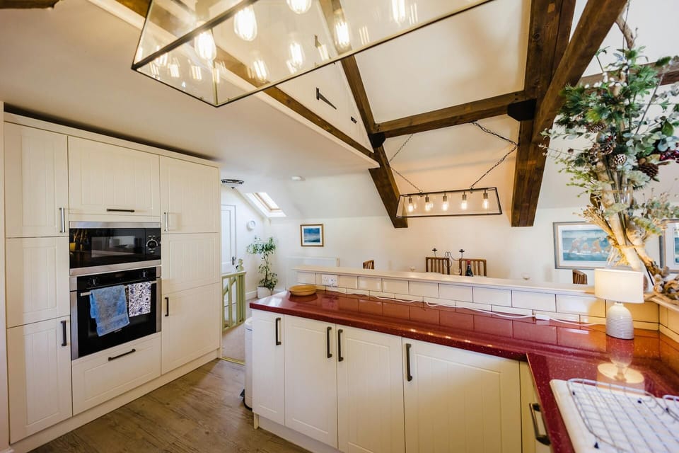 kitchen with matching appliances and integrated cooker.