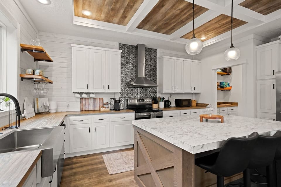 Our kitchen is fully stocked with dishes and cookware, ideal for cooking in.