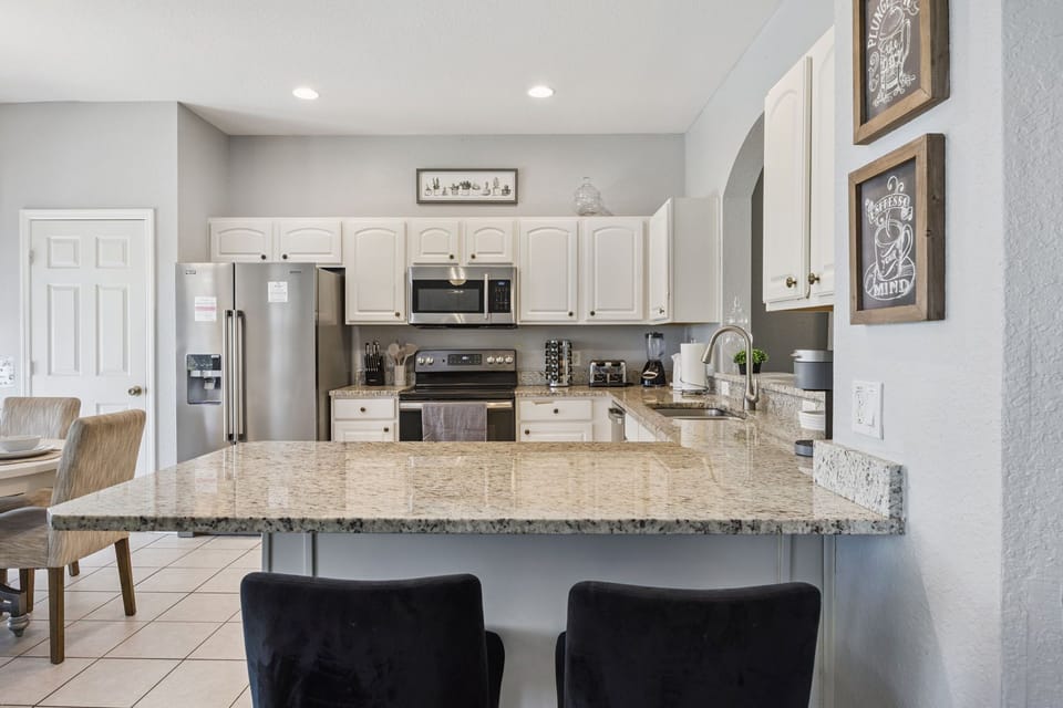 Fully equipped kitchen with stainless steel appliances
