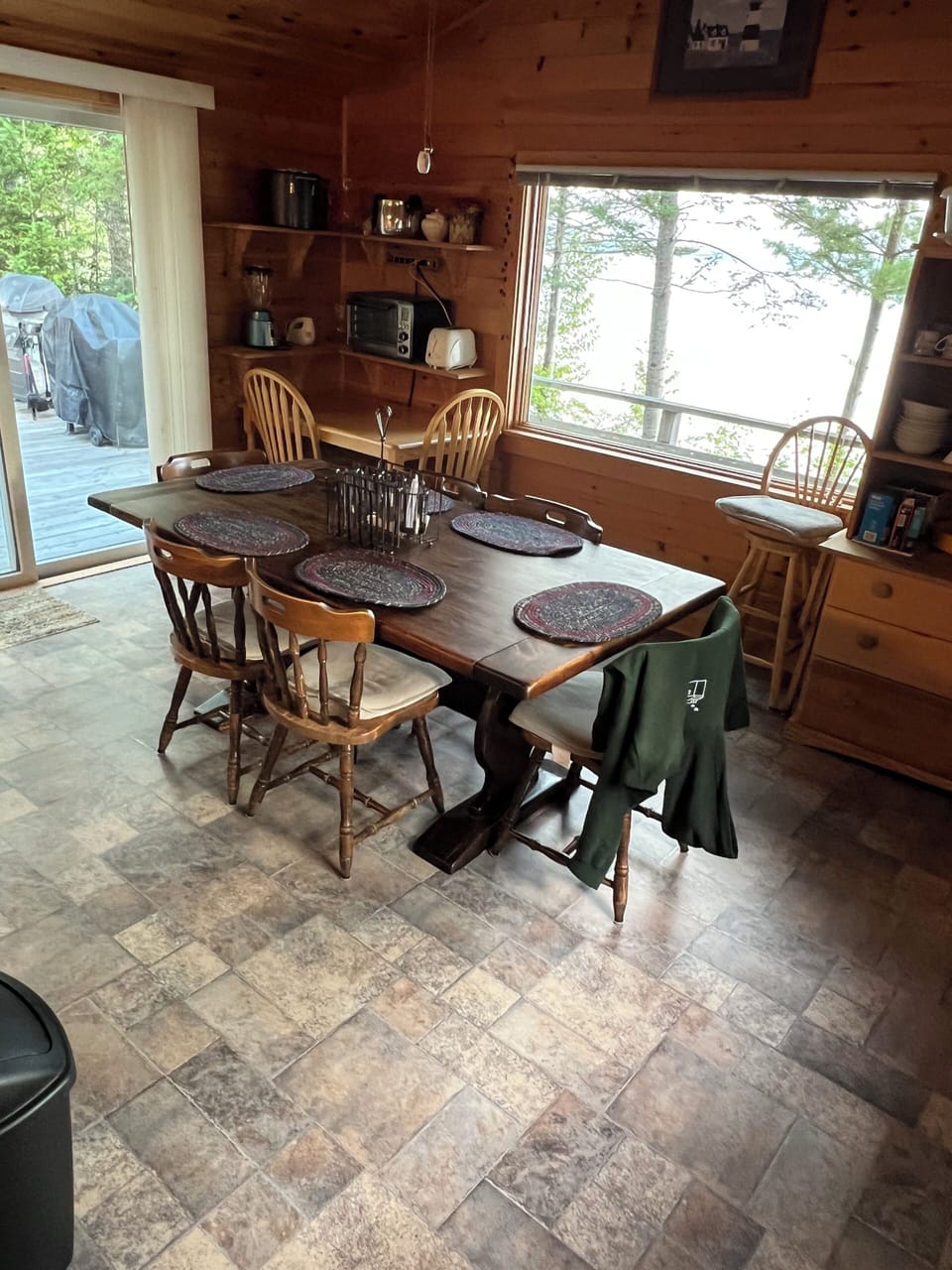 Dining room with the large picture window overlooking the lake
