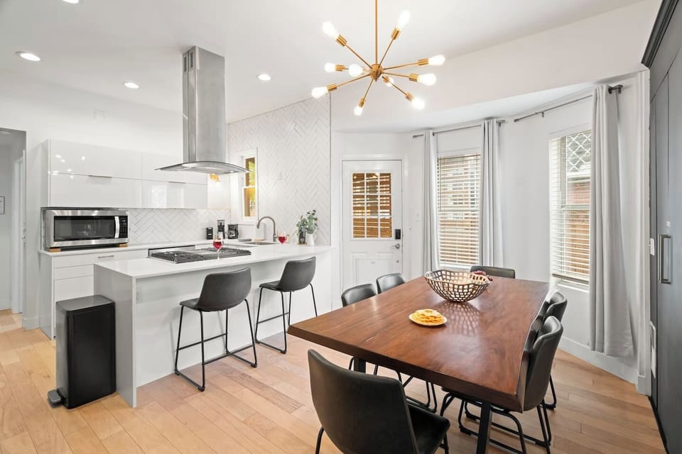 Vintage soul meets modern ease — this thoughtfully updated kitchen invites everything from home-cooked meals to laid-back takeout nights.