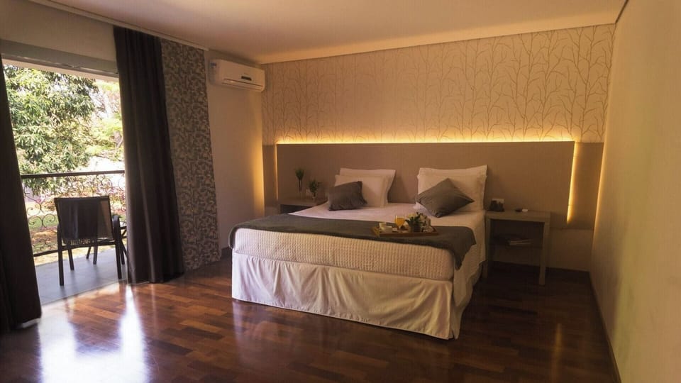 Wake up to leafy views from your private balcony seating