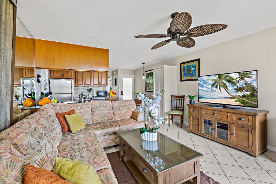 Spacious seating with a large TV.