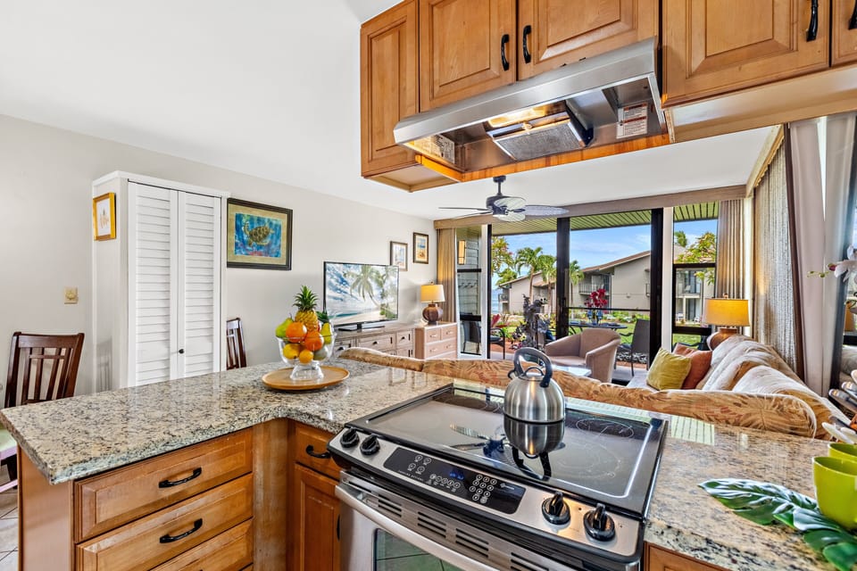 Gorgeous granite countertops with stainless steel appliances.