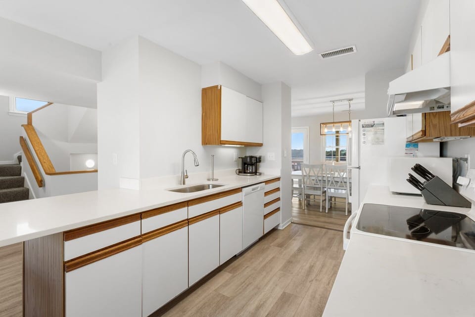 Main Level: Fully equipped kitchen with everything needed for beach meals and seafood dinners.