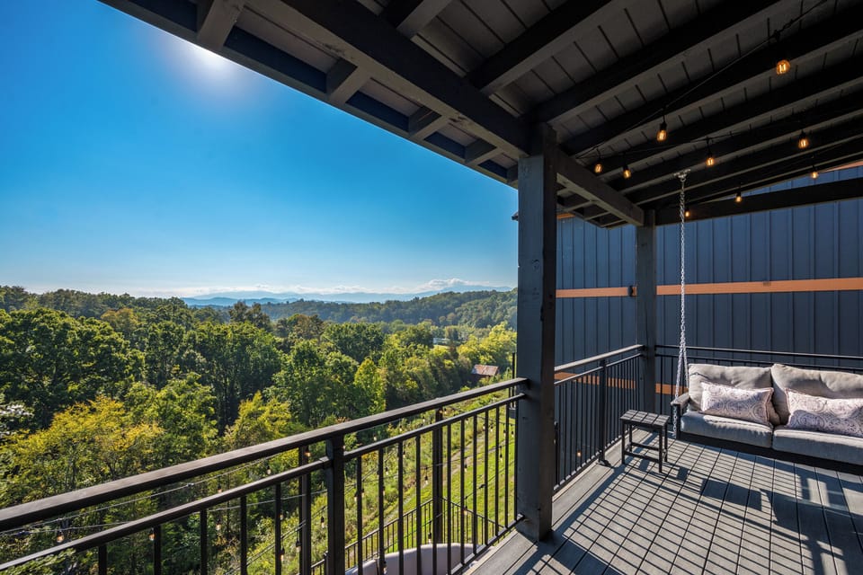 Enjoy the relaxing porch swing with views of the mountains