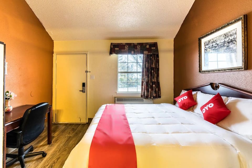 Settle in with an easy workspace and cozy bed.