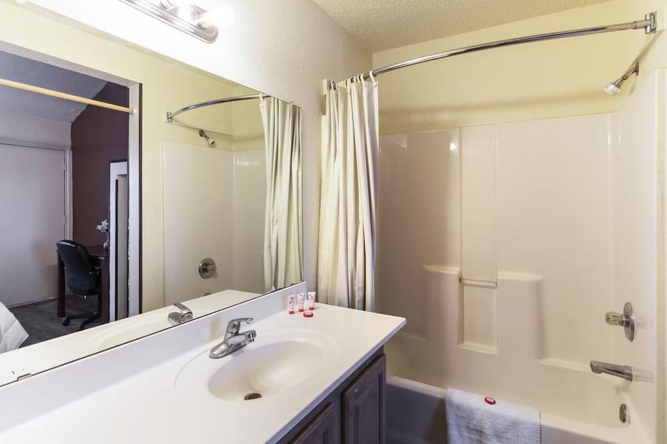 Refresh with a bright vanity and easy tub-shower combo.